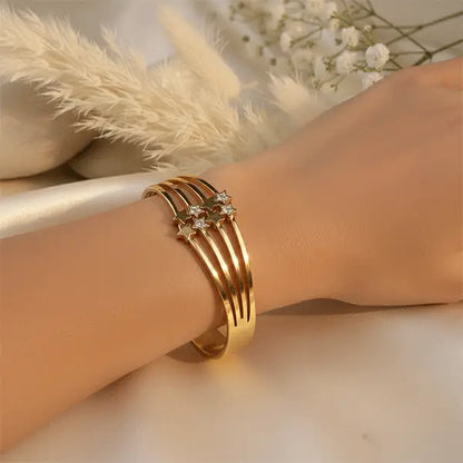 Shooting Star Bracelet by K-A Trends worn on wrist, anti-tarnish stainless steel bracelet, star design jewellery, not gold plated, everyday luxury wear