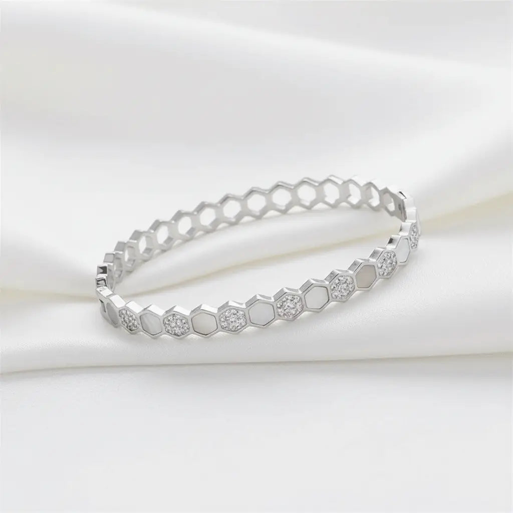 Minimal silver hexagon bracelet with crystal charms on white satin background – anti-tarnish women’s jewellery by K-A Trends.