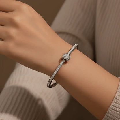 Elegant silver anti-tarnish bangle bracelet with triple-ring design worn on wrist – women’s fashion jewellery by K-A Trends.