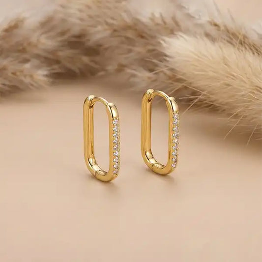 Anti-tarnish gold rectangular hoop earrings with zircon stones, minimalist soft bling hoops on beige background
