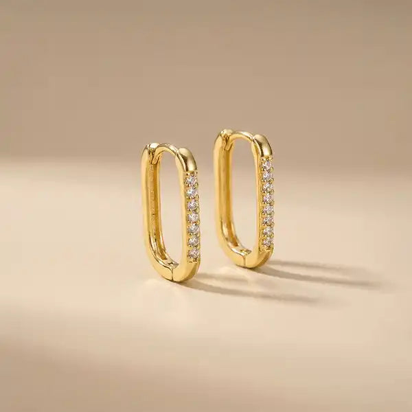 Anti-tarnish gold rectangular hoop earrings with zircon detailing, modern minimalist hoop jewellery on neutral backdrop