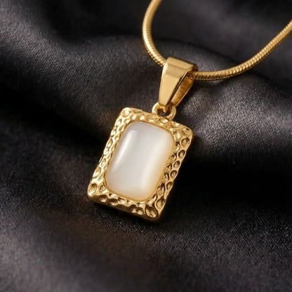 Stone Frame Pendant anti-tarnish gold rectangular pendant with white stone close-up