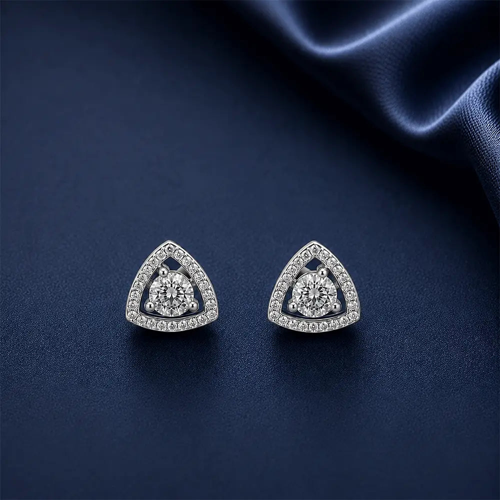Trinity AD Stud Earrings – Silver Crystal Triangle Stud Earrings on Navy Blue Background
