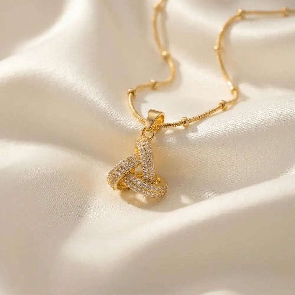 Gold geometric pendant necklace with crystal detailing on satin fabric, anti-tarnish minimal jewelry by Ka Trends