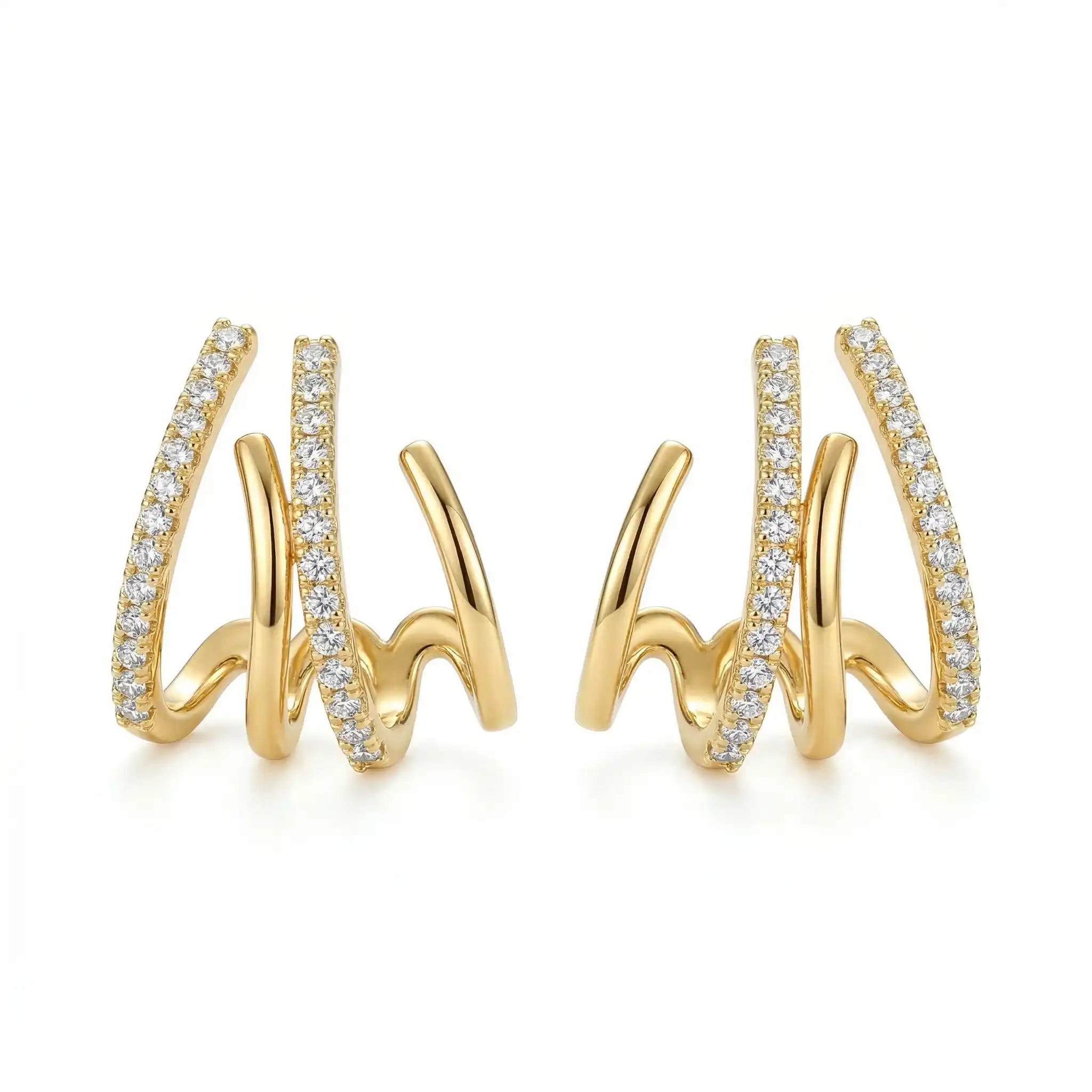Triple spike AD stud earrings displayed on a plain white background, featuring three curved bars with one lined in sparkling stones.