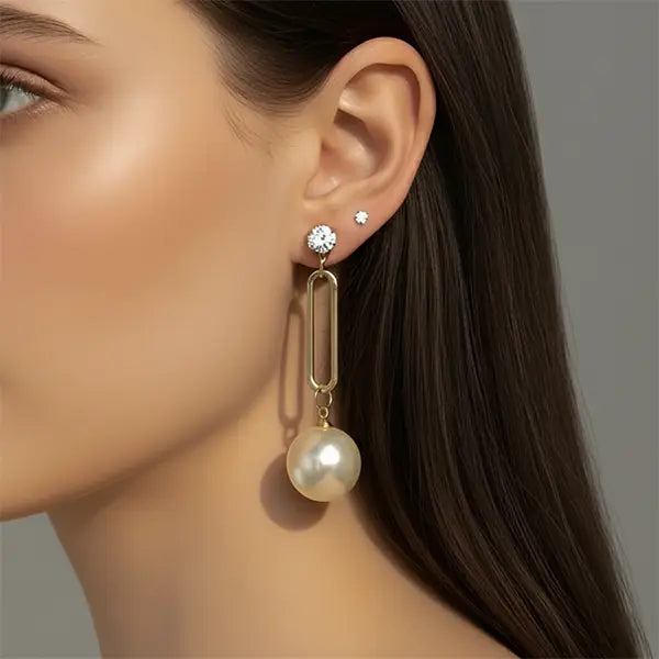 Model wearing Timeless Pearl Drops earrings – elegant long pearl dangle design, lightweight