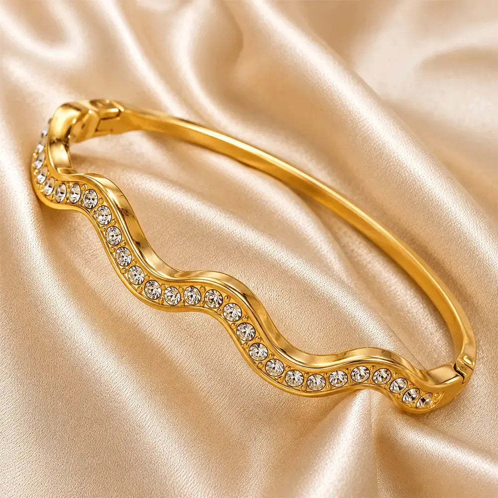 Close-Up Gold Wave Bracelet with Crystal Detailing