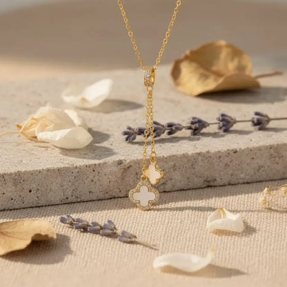 Gold Duo Clover Pendant Necklace with Anti-Tarnish finish and Mother-of-Pearl inlay. A delicate Y-drop style charm necklace.