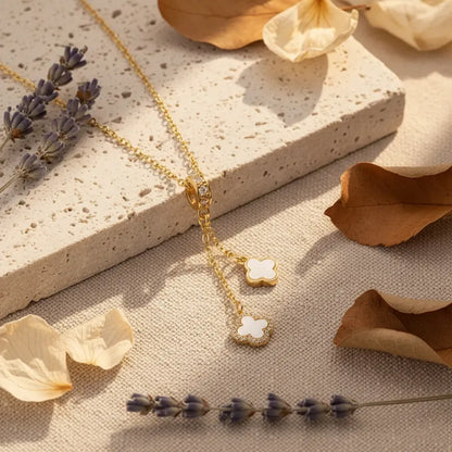 Gold Duo Clover Pendant Necklace with Anti-Tarnish finish and Mother-of-Pearl inlay. A delicate Y-drop style charm necklace.