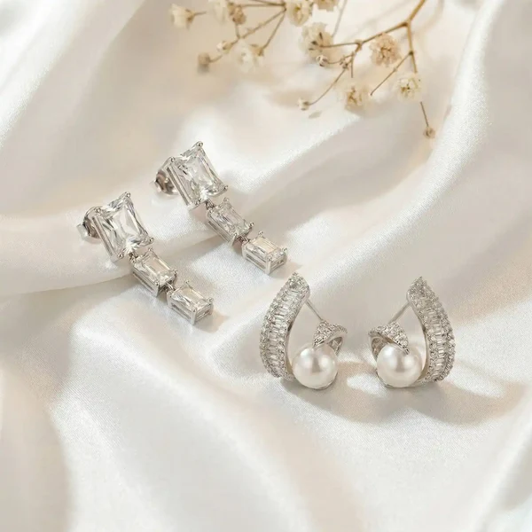 K-A Trends anti tarnish silver earrings combo with baguette crystal drop earrings and pearl curved statement studs luxury evening wear