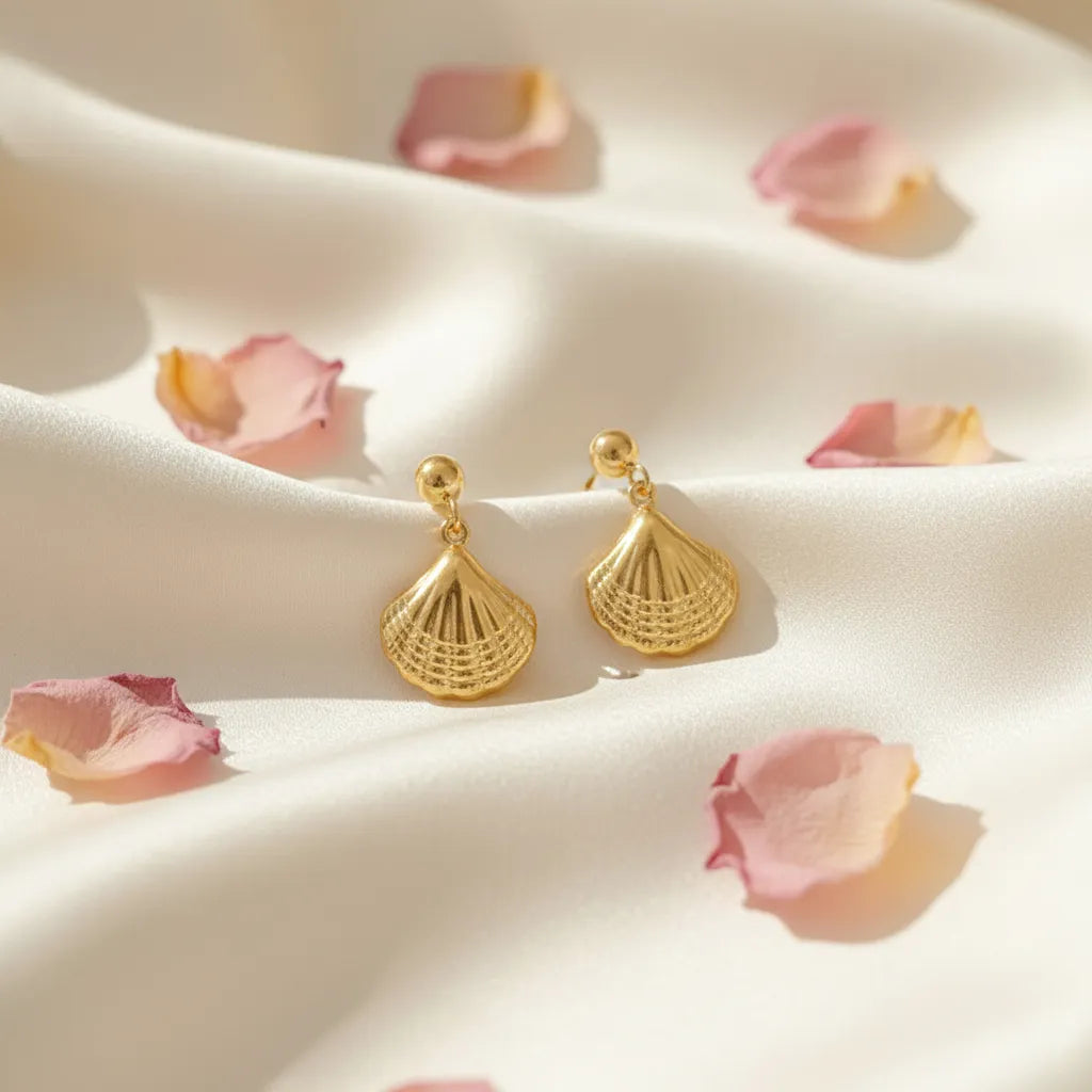 Anti-tarnish gold shell drop earrings. Beach jewelry, fan-shaped shell pendant.