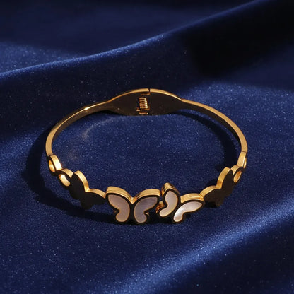 Premium anti-tarnish Butterfly Bracelet, it features delicate butterfly designs that shine with every move. 