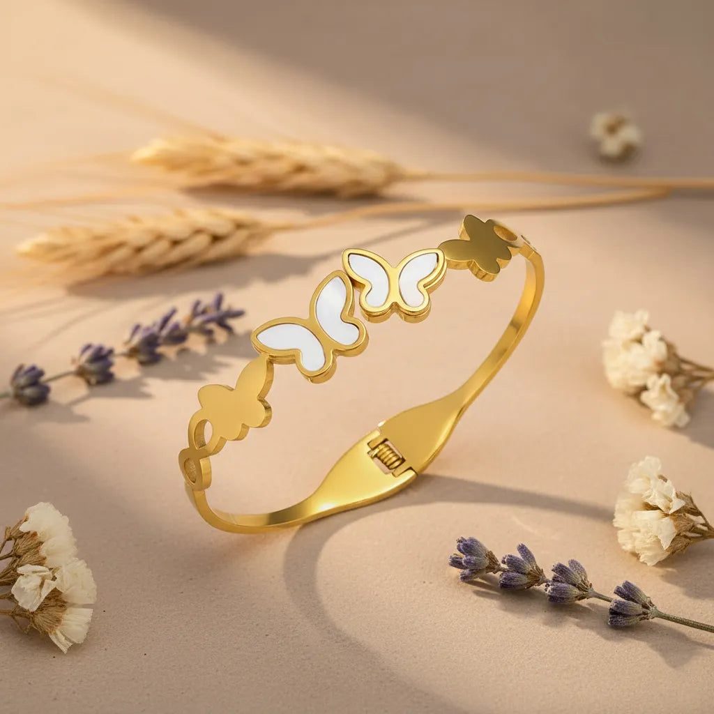 Premium anti-tarnish Butterfly Bracelet, it features delicate butterfly designs that shine with every move. 