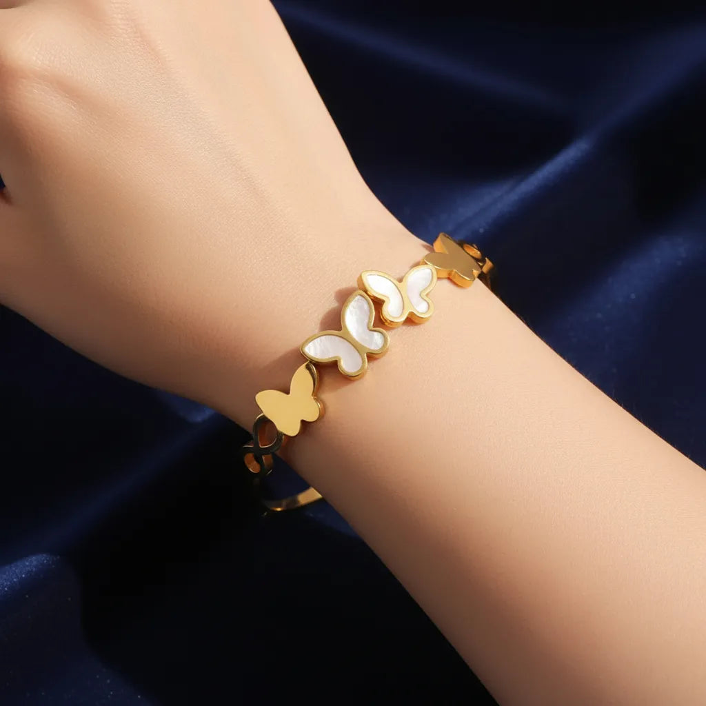 Premium anti-tarnish Butterfly Bracelet, it features delicate butterfly designs that shine with every move. 