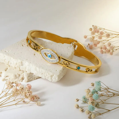 Gold evil eye anti-tarnish bracelet- A symbol of strength and protection.